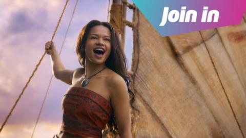 Actress Catherine Laga'aia is seen as Moana, holding onto a rope on a ship. her mouth is open as she sings the films title track ' How far I'll go'.