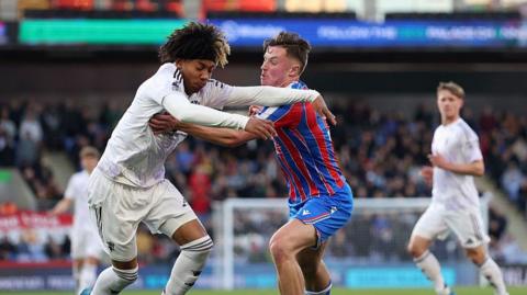 Crystal Palace's Dean Benamar tussles with Manchester United's Junior Brown in the Premier League U18 cup final at Selhurst Park