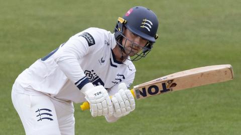 Leus du Plooy plays a shot for Middlesex against Northamptonshire at the County Ground in April 2026.