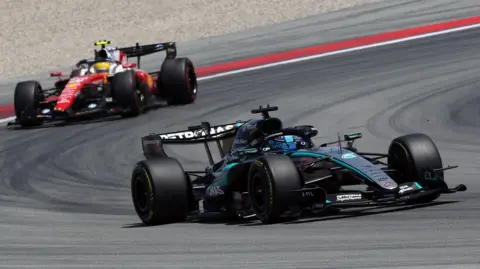 Mercedes' George Russell ahead of Ferrari's Lewis Hamilton in the Barcelona-Catalunya Grand Prix