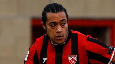 Miguel Azeez in action for Morecambe