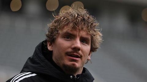 Nick Woltemade arrives before Newcastle United's game against Brentford at St James' Park in February 2026