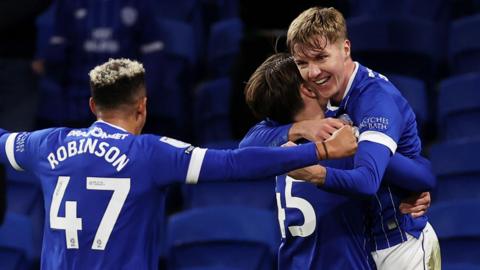 Joel Bagan (right) celebrates scoring the winning goal for Cardiff