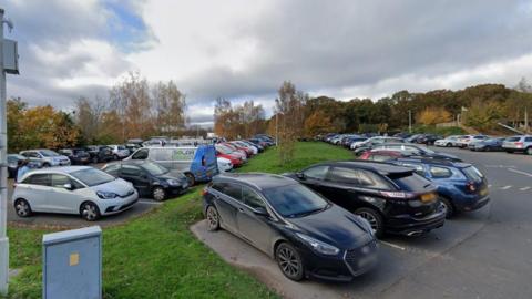 General view of rows of cars parked at Worcester Woods Car Park.