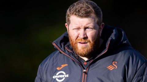 Chris Church in the Swansea dugout