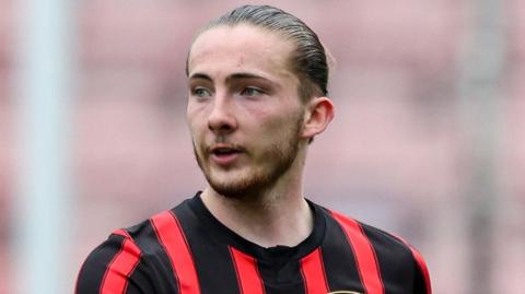 Wales Under-21 footballer Archie Harris playing football for Bournemouth, who loaned the defender to Eastleigh for the 2025-26 season