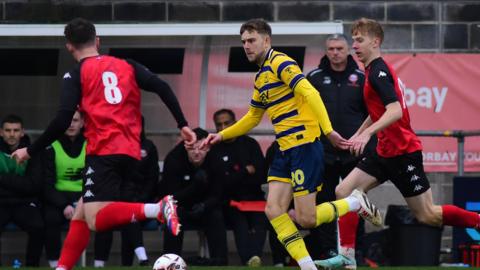 Action from Torquay United v Truro City