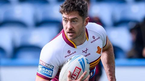 Adam Clune in action for Huddersfield Giants