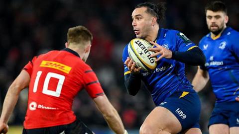 James Lowe with the ball