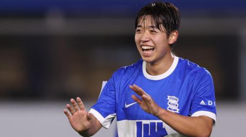Birmingham City's Japanese forward Ayumu Yokoyama smiles as he celebrates a goal