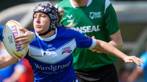 Barrow Raiders Ladies player makes a tackle