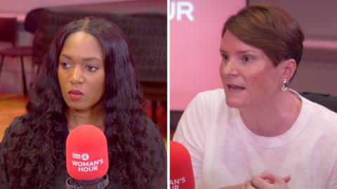 Two women speak into red microphones.