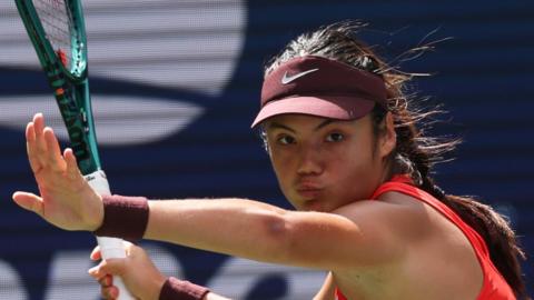 Emma Raducanu hits a forehand return at the 2025 US Open