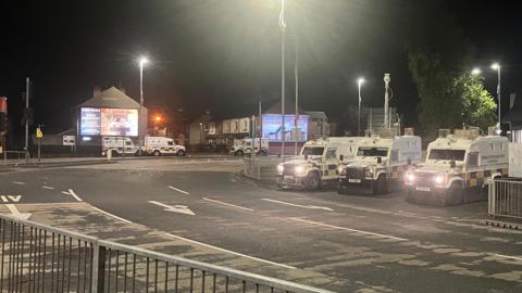 Police vehicles near Broadway roundabout in south Belfast on 15 July, 2024