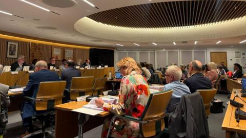 Councillors and residents in a meeting room at Guildford Borough Council.