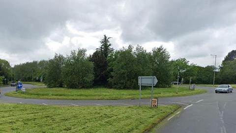 Beehive roundabout in Bolton on a cloudy day.