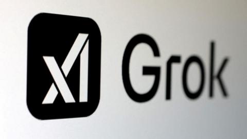 The black xAI Grok logo is set against a white background