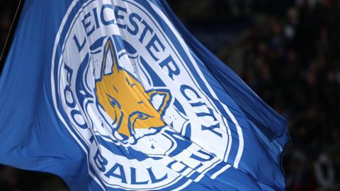 A flag with the Leicester City logo on it