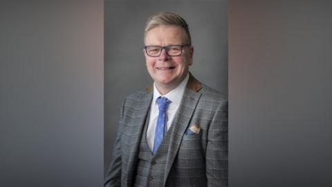 Portrait of Cheshire East Councillor and deputy mayor Rob Moreton