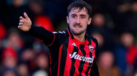 Will Dean was sent off in the closing moments of the draw with Tamworth