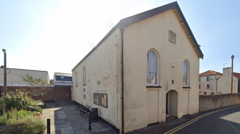 Armstrong Hall - a cream coloured building