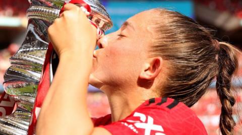 Maya le Tissier kisses the FA Cup