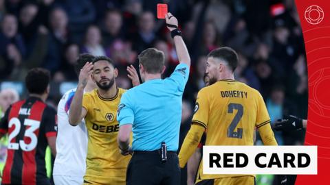 Wolverhampton Wanderers' Matheus Cunha is shown a red card