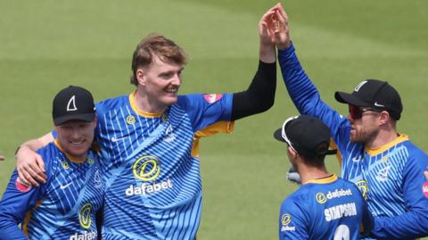Sean Hunt takes a wicket for Sussex