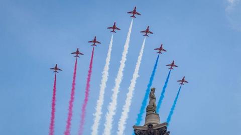 Red Arrows performing in the sky.