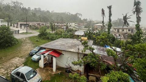 This picture shows a general view of a residential area as rain falls ahead of the arrival of the forecasted Super Typhoon Bavi in Saipan, Northern Mariana Islands, on July 5, 2026.
