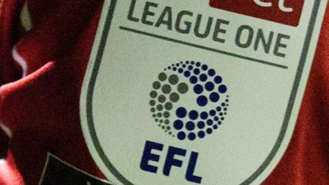 The EFL League One logo on the arm of a football shirt