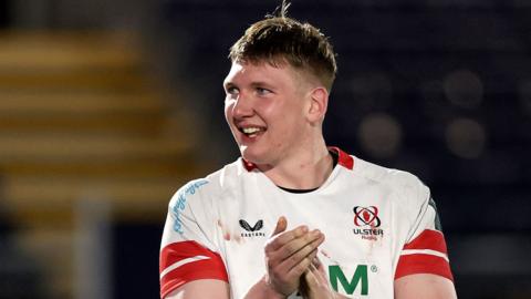 Charlie Irvine celebrates