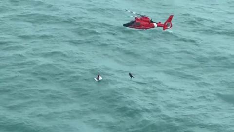 Rescue operation at sea with helicopter 