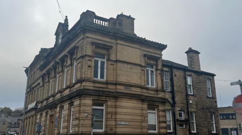 Brighouse Town Hall - a light brown Victorian building