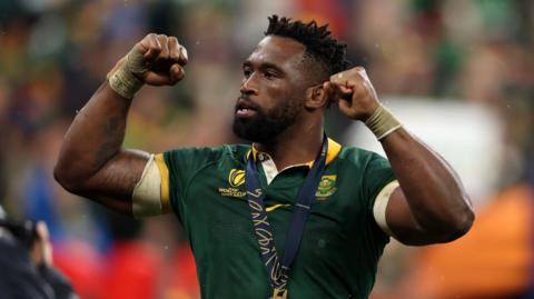 South Africa captain Siya Kolisi celebrates winning the Rugby World Cup in 2023