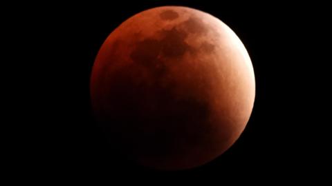 An image of the Moon captured during the lunar eclipse on 7 September when the Moon took on a red hue as it passed through Earth's shadow.