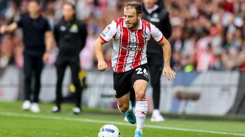 Southampton's Ryan Fraser running with the ball at his feet during the derby against Portsmouth