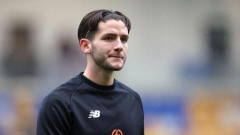 Ricky Aguiar of York City looks on, during the warm up prior to National League match between York City and Yeovil Town