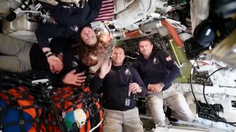 Astronauts in their rocket in space