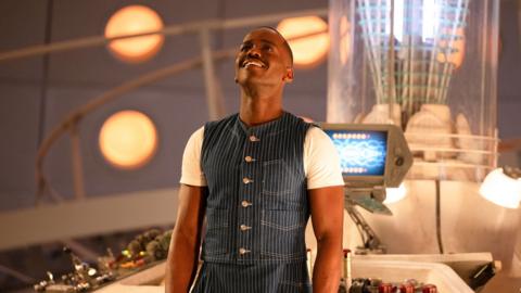 Ncuti Gatwa stands in the TARDIS as the Doctor 
