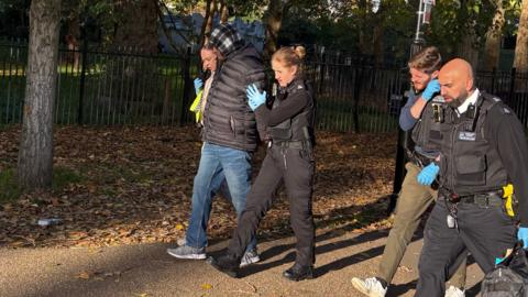 Kebatu escorted out of the park after arrest