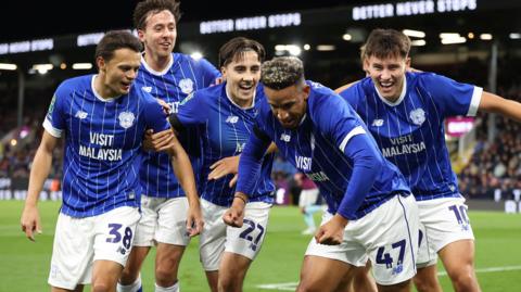 Callum Robinson (second right) celebrates scoring for Cardiff at Burnley