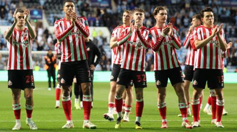 Sunderland players applaud the away fans at Coventry City