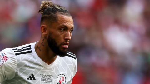 Kellan Gordon in action for Crawley Town in the League Two play-off final at Wembley