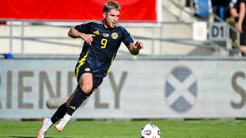 George Hirst in action for Scotland against Liechtenstein