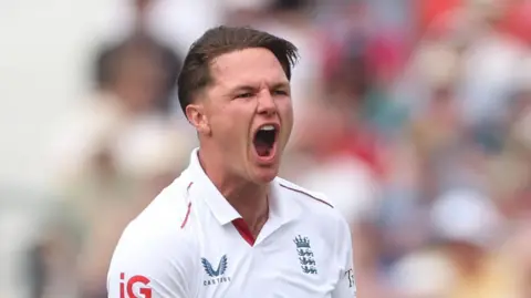 England bowler Sonny Baker celebrates taking a wicket
