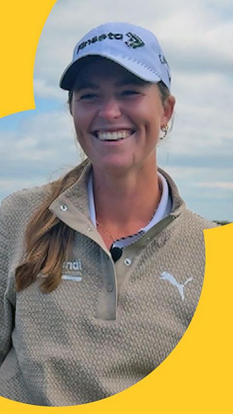 Mimi Rhodes, wearing golf attire, smiles