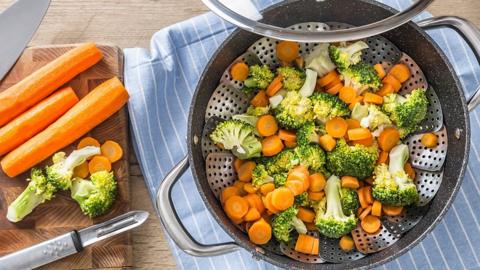 Broccoli and carrot in a pan