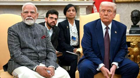 US President Donald Trump speaks with the press as he meets with Indian Prime Minister Narendra Modi in the Oval Office of the White House in Washington, DC, on February 13, 2025. (Photo by Jim WATSON / AFP) (Photo by JIM WATSON/AFP via Getty Images)