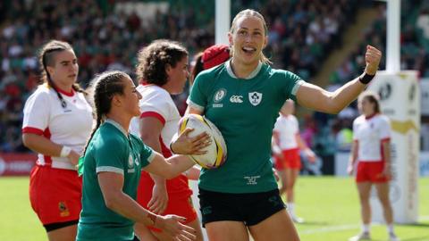 Anna McGann celebrates try
